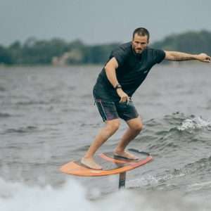 Close-up of the WakeFoil board available for rent at Wake Bros Rentals, offering thrilling rides above the water's surface.