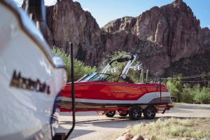 Group of friends having fun on a MasterCraft boat, available through Wake Bros Rentals.