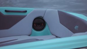 a zoomed image of MasterCraft NXT22 boat on the water from Wake Bros Rentals.