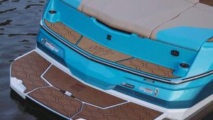 A blue and white boat with brown seats, Wake Bros Rentals, Mastercraft - NXT24.