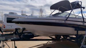 A sleek and modern Reinell boat available for rental, providing a premium water experience with Wake Bros Rentals.