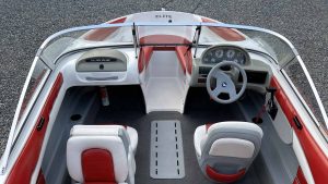 Wake Bros Rentals Glastron boat with steering wheel and dashboard.